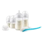 Shop Philips Avent Natural Response newborn starter gift set featuring four newborn baby feeding bottles, a pacifier, and a blue brush online at best price in Pakistan